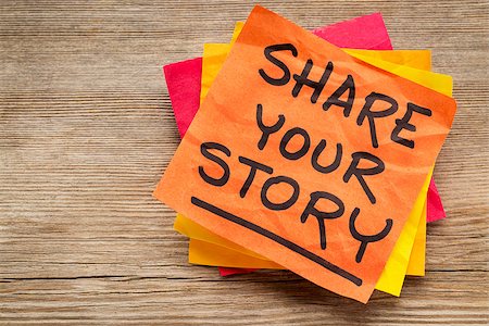 share your story suggestion on a sticky note against grained wood Stock Photo - Budget Royalty-Free & Subscription, Code: 400-07575673