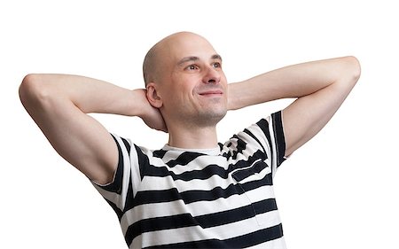 Man relaxing with hands behind his head isolated on white background Stock Photo - Budget Royalty-Free & Subscription, Code: 400-07575790