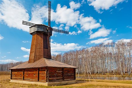 simsearch:400-07576056,k - Beautiful wooden windmill in a field in spring Foto de stock - Super Valor sin royalties y Suscripción, Código: 400-07576062