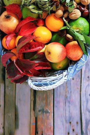 Photo of white basket with autumn fruits Stock Photo - Budget Royalty-Free & Subscription, Code: 400-07576196