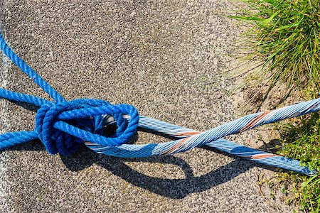 Blue Rope And Knot On asphalt Background Stockbilder - Microstock & Abonnement, Bildnummer: 400-07576245