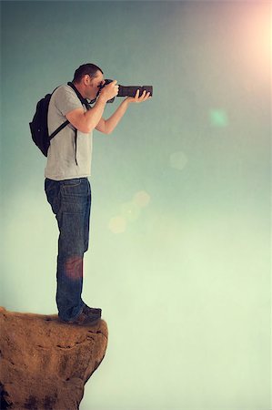photographer shooting from a high vantage point Stock Photo - Budget Royalty-Free & Subscription, Code: 400-07576554