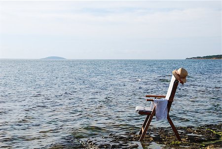 Chair at the coast of Baltic sea at the island oland in sweden Foto de stock - Super Valor sin royalties y Suscripción, Código: 400-07577430