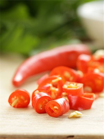 simsearch:400-07211737,k - fresh red chili peppers on a wooden board Photographie de stock - Aubaine LD & Abonnement, Code: 400-07577474