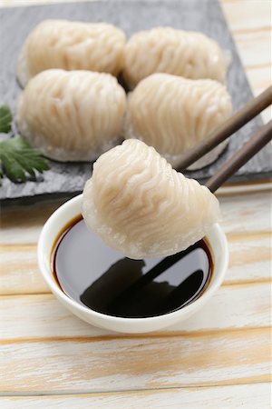 simsearch:400-04025064,k - Asian steamed meat dumplings dim sum with soy sauce Stock Photo - Budget Royalty-Free & Subscription, Code: 400-07577475