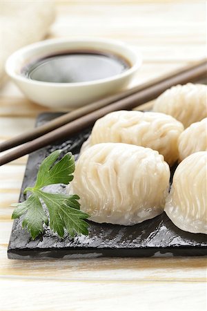 simsearch:400-04025064,k - Asian steamed meat dumplings dim sum with soy sauce Stock Photo - Budget Royalty-Free & Subscription, Code: 400-07577472
