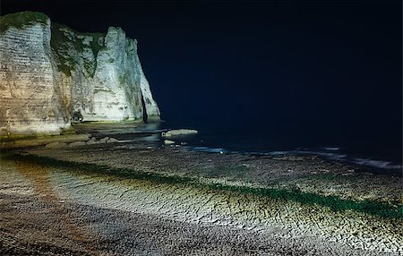 etretat - One of the three famous white cliffs known as the Falaise de Aval. Etretat, France. Night scene. March 2014. Photographie de stock - Aubaine LD & Abonnement, Code: 400-07578621