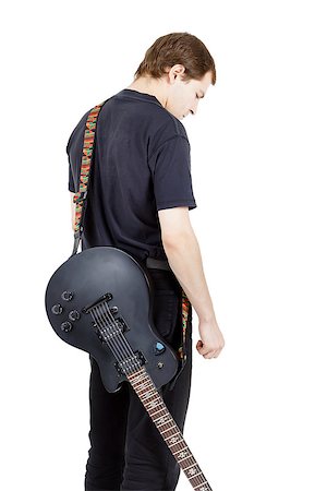 simsearch:400-04921650,k - Man with a guitar on a white background. Performer with an electric guitar Stock Photo - Budget Royalty-Free & Subscription, Code: 400-07579036