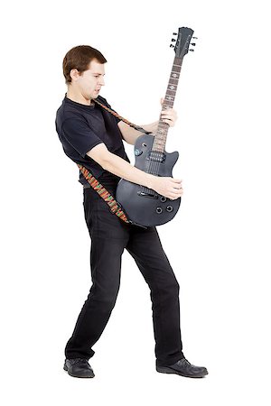 simsearch:400-04921650,k - Man with a guitar on a white background. Performer with an electric guitar Stock Photo - Budget Royalty-Free & Subscription, Code: 400-07579037