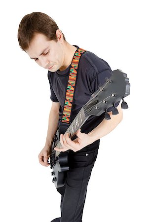 simsearch:400-04921650,k - Man with a guitar on a white background. Performer with an electric guitar Stock Photo - Budget Royalty-Free & Subscription, Code: 400-07579032