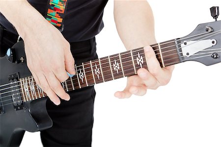 simsearch:400-04921650,k - Man with a guitar on a white background. Performer with an electric guitar Stock Photo - Budget Royalty-Free & Subscription, Code: 400-07579033
