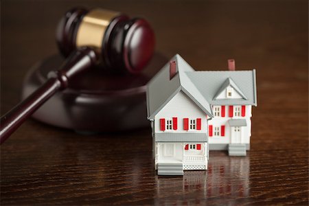 eviction - Gavel and Small Model House on Wooden Table. Stock Photo - Budget Royalty-Free & Subscription, Code: 400-07579706