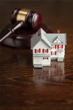 eviction - Gavel and Small Model House on Wooden Table. Stock Photo - Budget Royalty-Free & Subscription, Code: 400-07579707