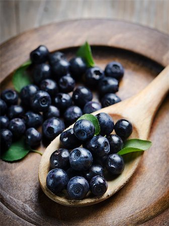 photos of blueberries for kitchen - Fresh blueberries in wooden spoon Stock Photo - Budget Royalty-Free & Subscription, Code: 400-07570761