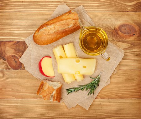 simsearch:400-07481817,k - Cheese, bread and spices over cooking board Stock Photo - Budget Royalty-Free & Subscription, Code: 400-07571492