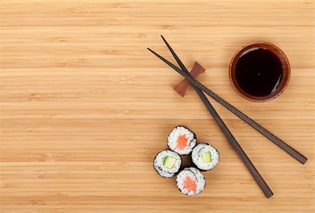 simsearch:400-08072780,k - Sushi set, chopsticks and soy sauce over bamboo table with copy space Stockbilder - Microstock & Abonnement, Bildnummer: 400-07571535