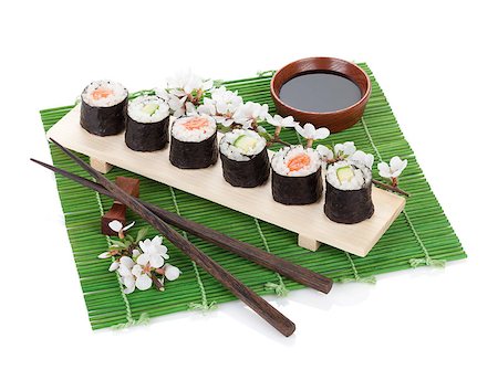 simsearch:400-08072780,k - Sushi set with fresh sakura branch. Isolated on white background Photographie de stock - Aubaine LD & Abonnement, Code: 400-07571541