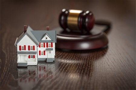 eviction - Gavel and Small Model House on Wooden Table. Stock Photo - Budget Royalty-Free & Subscription, Code: 400-07573272