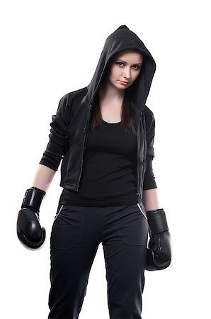 pzromashka (artist) - Young serious woman in boxing gloves on a white background Foto de stock - Super Valor sin royalties y Suscripción, Código: 400-07584633