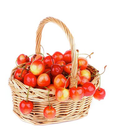 simsearch:400-08020671,k - Sweet Maraschino Cherries in Wicker Basket isolated on White background Stock Photo - Budget Royalty-Free & Subscription, Code: 400-07580481