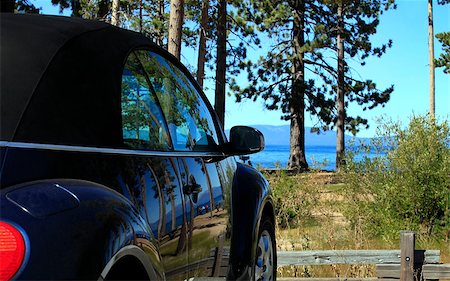 View from car at the lake amongst mountains. Shot in California, Lake Tahoe Foto de stock - Super Valor sin royalties y Suscripción, Código: 400-07580528