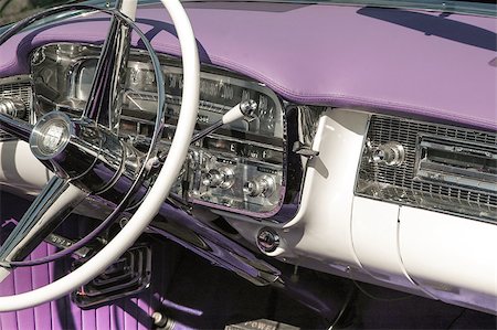purple car - dashboard and steering wheel on a classic car, circa 1950 Stock Photo - Budget Royalty-Free & Subscription, Code: 400-07580616