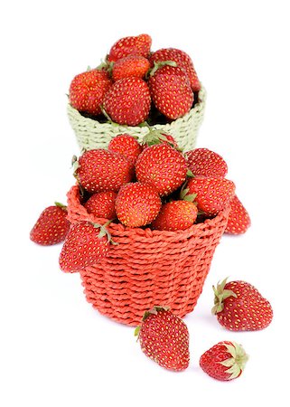 simsearch:400-08020671,k - Fresh Ripe Forest Strawberries in Red and Green Wicker Baskets isolated on White background Stock Photo - Budget Royalty-Free & Subscription, Code: 400-07580874