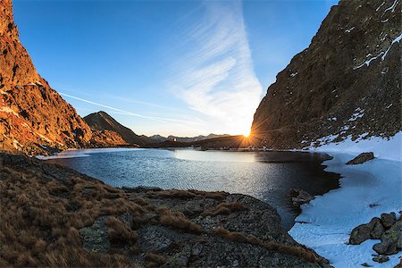 simsearch:400-07302061,k - sunrise in Caltun lake. Fagaras Mountains, Romania Foto de stock - Royalty-Free Super Valor e Assinatura, Número: 400-07580883