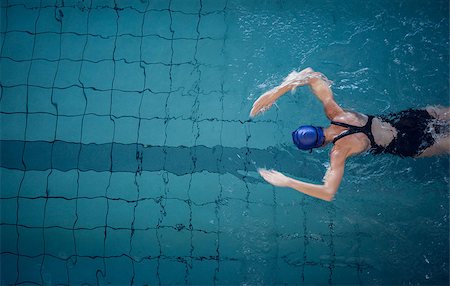 simsearch:400-07583085,k - Fit woman swimming in the pool at the leisure center Stock Photo - Budget Royalty-Free & Subscription, Code: 400-07582869