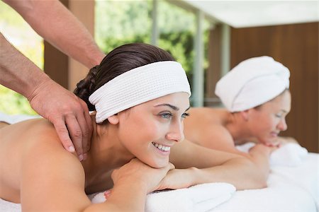 spa with female friend - Pretty friends getting massages together in the health spa Stock Photo - Budget Royalty-Free & Subscription, Code: 400-07583538