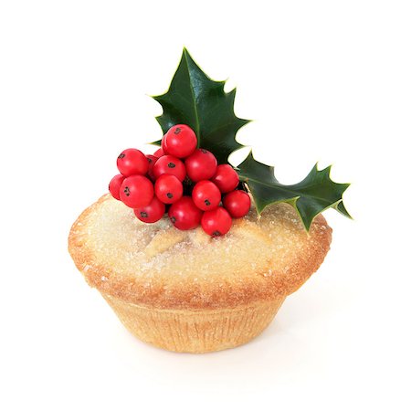 Mince pie with holy berry leaf sprig over white background. Stock Photo - Budget Royalty-Free & Subscription, Code: 400-07614226