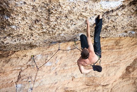 simsearch:400-07292725,k - Rock climber on his challenging way up Photographie de stock - Aubaine LD & Abonnement, Code: 400-07614665