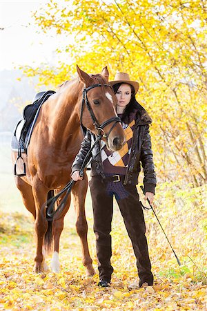 simsearch:400-07615021,k - equestrian with her horse in autumnal nature Stock Photo - Budget Royalty-Free & Subscription, Code: 400-07615020