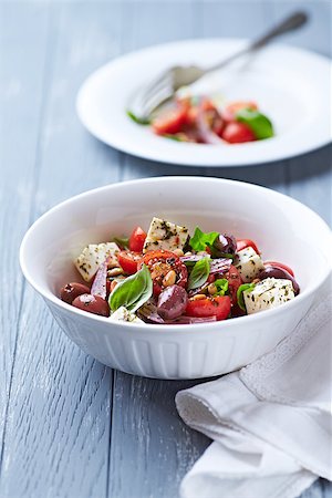 Cherry Tomato Salad with Feta Cheese and Pine Nuts Stock Photo - Budget Royalty-Free & Subscription, Code: 400-07615403