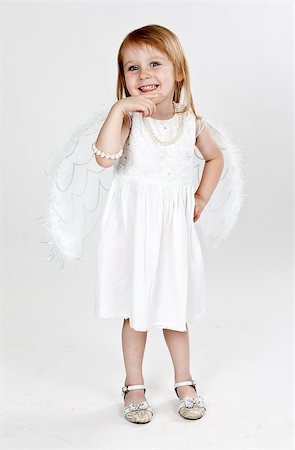 simsearch:400-04436228,k - little girl with wings on a gray background Stock Photo - Budget Royalty-Free & Subscription, Code: 400-07615708