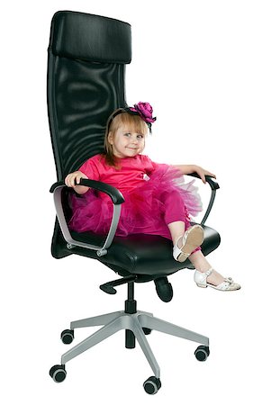 simsearch:400-07615708,k - little girl in an office chair black on a white background Stock Photo - Budget Royalty-Free & Subscription, Code: 400-07615703