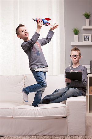 two boys playng as scientists and rocket inventors Stock Photo - Budget Royalty-Free & Subscription, Code: 400-07615798