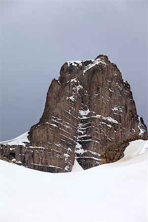 simsearch:400-07215536,k - Snow rocks and gray sky. Turkey, Central Taurus Mountains, Aladaglar (Anti Taurus) view from plateau Edigel (Yedi Goller) Foto de stock - Super Valor sin royalties y Suscripción, Código: 400-07616116