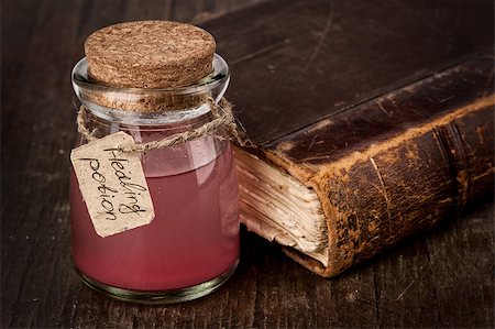 spell book - healing red potion close up Stock Photo - Budget Royalty-Free & Subscription, Code: 400-07616471