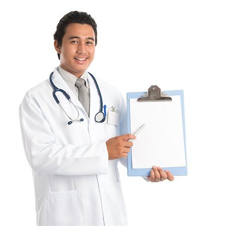 simsearch:400-05745246,k - Portrait of southeast Asian male medical doctor showing and pointing to a blank empty clip file with space , standing isolated on white background. Young man model. Photographie de stock - Aubaine LD & Abonnement, Code: 400-07616603