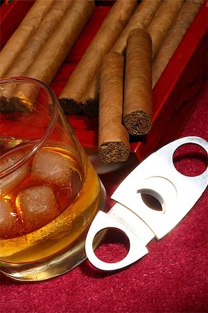 simsearch:400-05292494,k - cigars in the box and glass with whisky, close up shallow dof Stock Photo - Budget Royalty-Free & Subscription, Code: 400-07617205