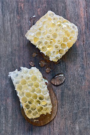 Honeycomb on a vintage wooden background Stock Photo - Budget Royalty-Free & Subscription, Code: 400-07617430
