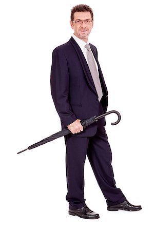 simsearch:400-04921907,k - mature attractive business man with umbrella isolated on white Stock Photo - Budget Royalty-Free & Subscription, Code: 400-07617529