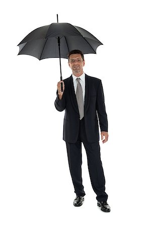 simsearch:400-04921907,k - mature attractive business man with umbrella isolated on white Stock Photo - Budget Royalty-Free & Subscription, Code: 400-07617531