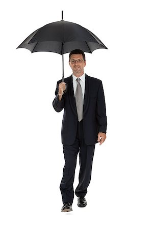 simsearch:400-04921907,k - mature attractive business man with umbrella isolated on white Stock Photo - Budget Royalty-Free & Subscription, Code: 400-07617533