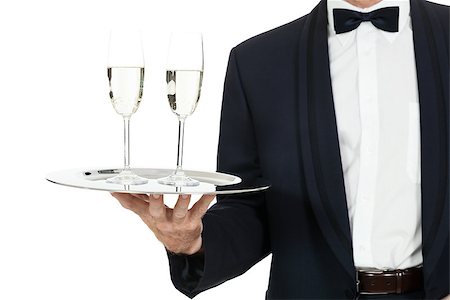 adult male waiter serving two glass of champagne isolated on white Stockbilder - Microstock & Abonnement, Bildnummer: 400-07617540