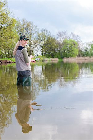 simsearch:400-07501738,k - woman fishing in pond in spring Photographie de stock - Aubaine LD & Abonnement, Code: 400-07617788