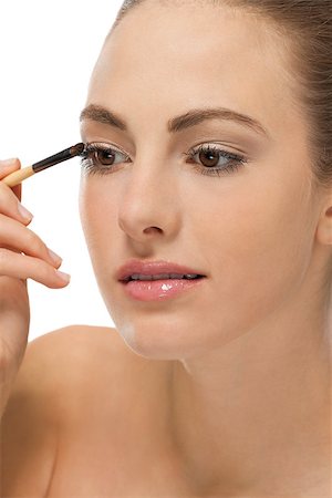 attractive woman in beauty salon make up brown eyeshadow professional Stock Photo - Budget Royalty-Free & Subscription, Code: 400-07617991