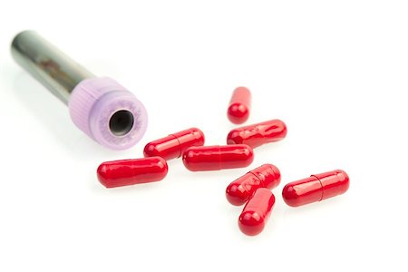 simsearch:400-07774098,k - test tube near red pills on white background Stock Photo - Budget Royalty-Free & Subscription, Code: 400-07618395