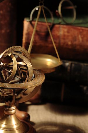 Vintage still life with Armillary sphere globe near books Stock Photo - Budget Royalty-Free & Subscription, Code: 400-07618540